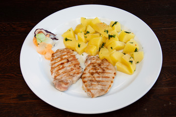 pork barbecue with nature potatoes and salad