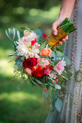 Bride's Hand Holding Bouquet