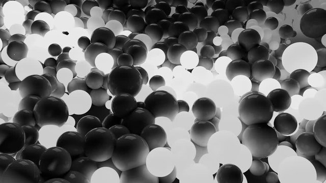 4k 3D seamless loop animation of beautiful gray and white small and large spheres or balls cover plane as abstract geometric background. Some spheres glow. 11