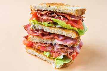 A BLT is a type of sandwich, named for the initials of its primary ingredients, bacon, lettuce and tomato