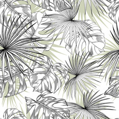Seamless pattern with tropical monstera and palm leaves.
