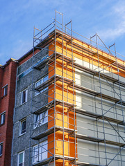 house facade renovation and thermal insulation, scaffolding