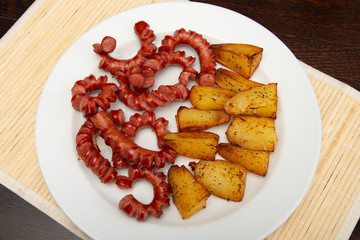 sliced sausages with  nature potatoes