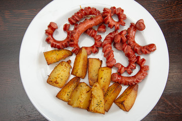 sliced sausages with  nature potatoes