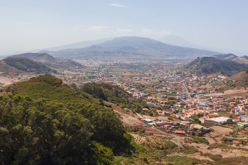 Obraz premium Aerial view on the vast valley and La Laguna village surrounded with Anaga massif, Tenerife, Canary Islands, Spain.