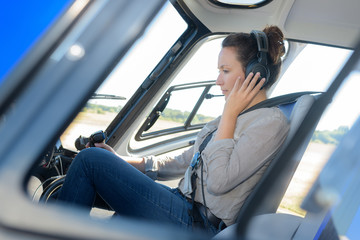 serious woman helicopter pilot