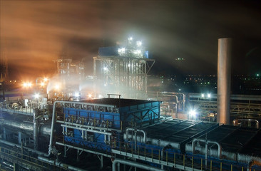Fototapeta na wymiar Night view of the plant for the production of nitrogen and mineral fertilizers.