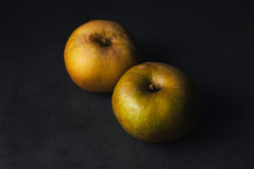 Top view with lateral lightning of two apples