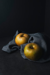 apples wrapped in dishcloth
