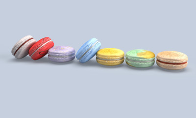 Colorful pastel French macarons on a solid background