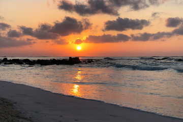 Beautiful sunset on the beach and sea