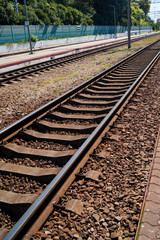 Naklejka premium Rails, sleepers, railway close-up - vertical photo. Railroads