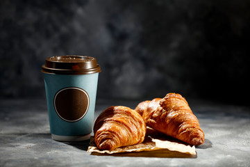 Fresh hot coffee and croissant 