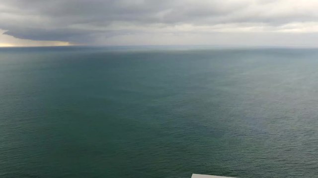 Aerial view of Tonsupa Beach in Ecuador, lots of buildings on a cloudy day