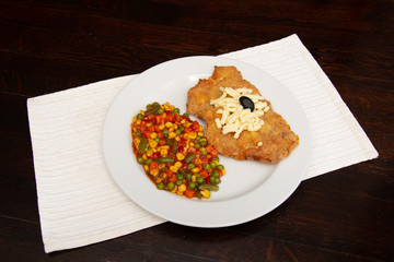 Stuffed fillet and vegetable salad