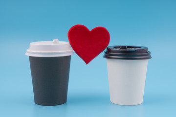 Two cup of coffee with a red heart. For him and for her. drink in love