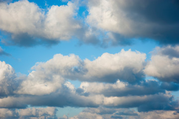 Obraz premium Tropical clouds floating in front of Mediterranean blue sky