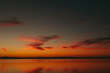 Nice sunset on the lake of the Albufera of Valencia and a summer afternoon