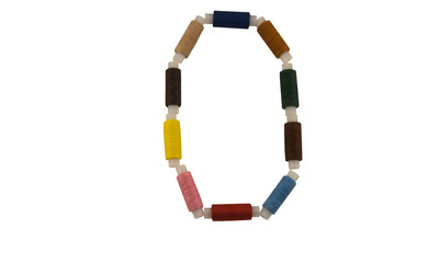 Isolated Font English or Latin or Russian letter O colorful spools of thread for sewing on white...