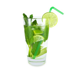 Glass of mojito or natural lemonade with lime slices, mint leaves and straw isolated on white background