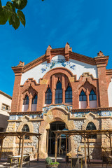 Fototapeta na wymiar Building of the Wine Cathedral in El Pinell de Brai, Tarragona, Catalonia, Spain. Vertical.