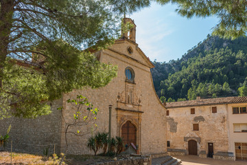 Fototapeta na wymiar Sanctuary of La Fontcalda, Catalonia, Tarragona, Spain with the entrance and bell
