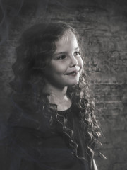 Portrait of a little girl in retro style