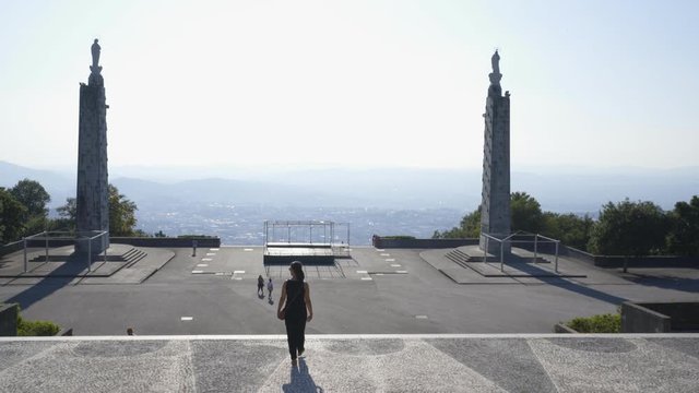 Woman walking in Santuario do Sameiro Sanctuary in Braga, Portugal