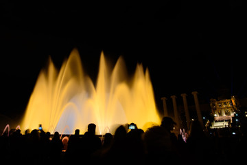 The colorful water show of Magic Fountain of Montjuic with light and music in Barcelona , Spain
