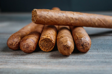 Cigars on the wooden background