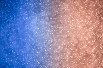 glitter bokeh of light background .Abstract blurred light.blue and red color