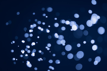 Blue glitter bokeh of light.Abstract blurred light