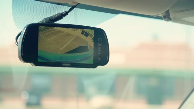 Trucker Activates Rear Camera Rear-view Mirror To See Behind his Vehicle