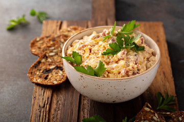 Homemade reuben dip with corned beef served with rue crackers