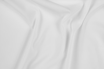 Abstract white fabric texture background. Cloth soft wave. Creases of satin, silk, and cotton.	