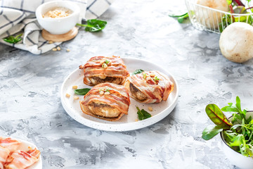 Baked mushrooms stuffed with cheese and pine nuts