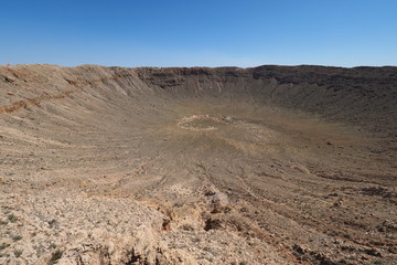 Meteor Crater near Winslow, Arizona on clear cloudless summer afternoon.