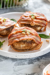 Baked mushrooms stuffed with cheese and pine nuts
