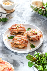Baked mushrooms stuffed with cheese and pine nuts