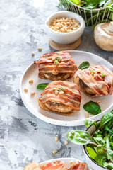 Baked mushrooms stuffed with cheese and pine nuts
