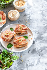 Baked mushrooms stuffed with cheese and pine nuts
