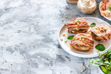 Baked mushrooms stuffed with cheese and pine nuts