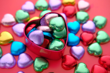 close up of heart shape candy in a gift box 