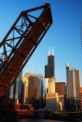 The Kedzie Bridge, permanently open, frames the Chicago skyline