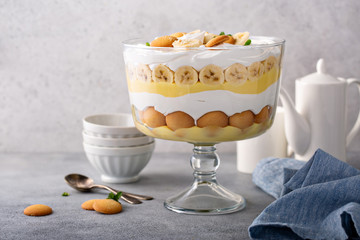 Banana pudding trifle with vanilla wafers in a large digh glass
