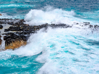 Wave Crashes Over Reef