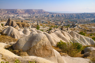 Rock formations of mountain ridges, valleys and pinnacles at Göreme National Park, Cappadocia, Turkey