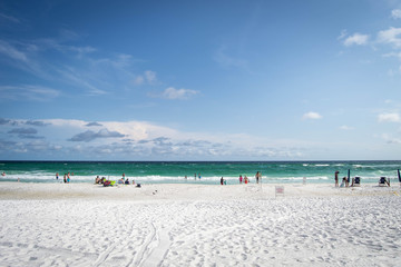 Fototapeta premium People hanging out at open spacious beach