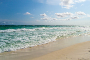 Open beach with clear turquoise water