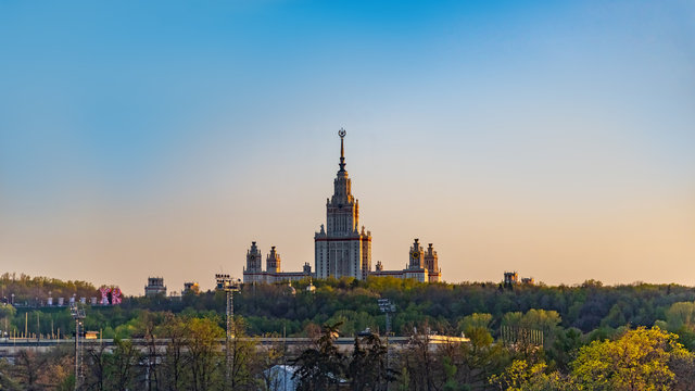 Cityscape with the silhouette of the building of the Lomonosov Moscow State University at sunset. Moscow, Russia.